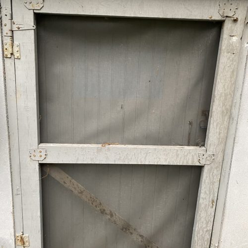 Mold-damaged screen door before rebuilding by The Island Handyman