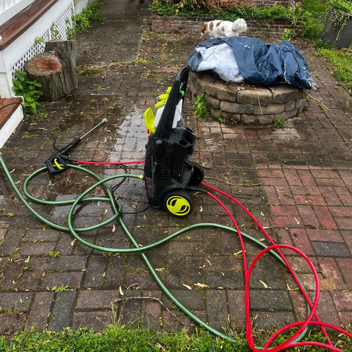 Brick patio before pressure washing by The Island Handyman